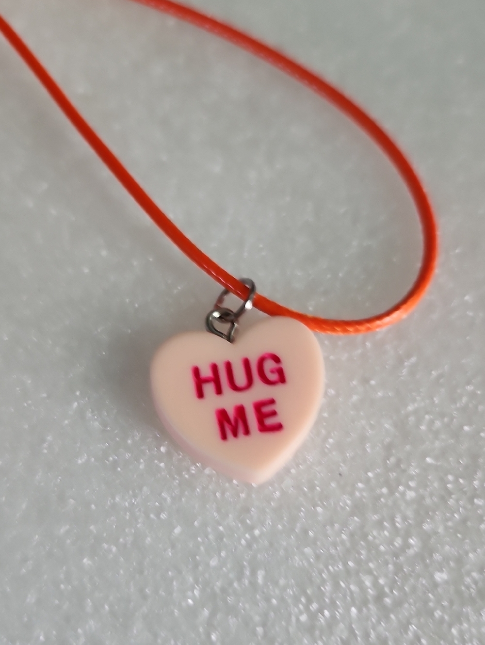 Hand Crafted Peach Heart 'HUG ME' Necklace with Orange Cord